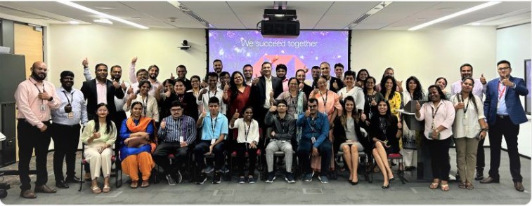 The group of interns Rachel mentored at HSBC, photographed together in a conference room